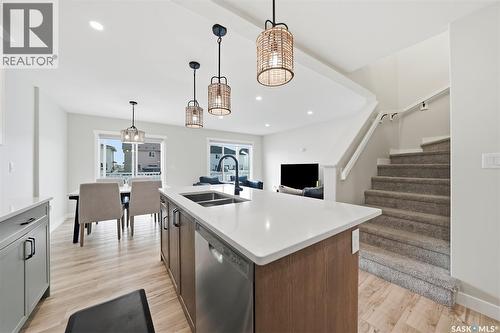 210 Schmeiser Bend, Saskatoon, SK - Indoor Photo Showing Kitchen With Double Sink
