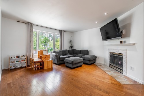 Salon - 1538 Rue De Gascogne, Laval (Chomedey), QC - Indoor Photo Showing Living Room With Fireplace