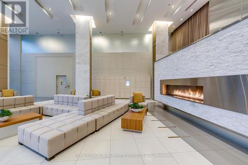 203 - 16 Brookers Lane, Toronto, ON - Indoor With Fireplace