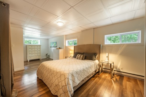 Salle familiale - 2034 Route 337, Sainte-Julienne, QC - Indoor Photo Showing Bedroom