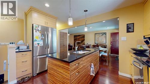 3307/3309 Dawson Crescent, Regina, SK - Indoor Photo Showing Kitchen With Double Sink