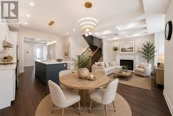 Virtually Staged Dining and Family Room - 