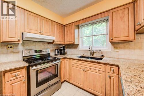 94 Mccarron Crescent, Waterloo, ON - Indoor Photo Showing Kitchen With Double Sink