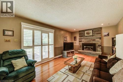 94 Mccarron Crescent, Waterloo, ON - Indoor Photo Showing Living Room With Fireplace