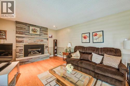 94 Mccarron Crescent, Waterloo, ON - Indoor Photo Showing Living Room With Fireplace