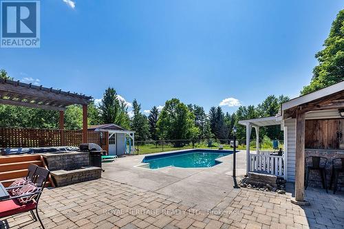 1238 Tapley 1/4 Line, Cavan Monaghan, ON - Outdoor With In Ground Pool With Deck Patio Veranda