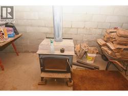Wood burning stove in basement - 