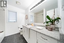 White vanity with integrated sink and patterned countertop - 