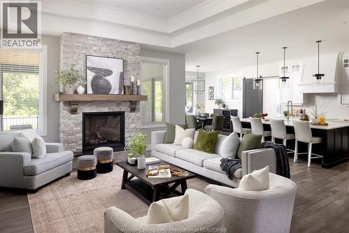 6005 Silver Maple Road, Lasalle, ON - Indoor Photo Showing Living Room With Fireplace