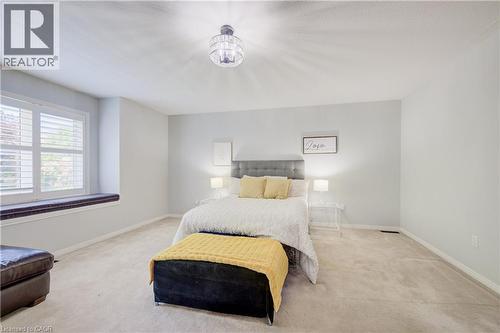 Spacious room with light neutral wall tones and plush carpet flooring - 23 Buerkle Court, Kitchener, ON - Indoor Photo Showing Bedroom