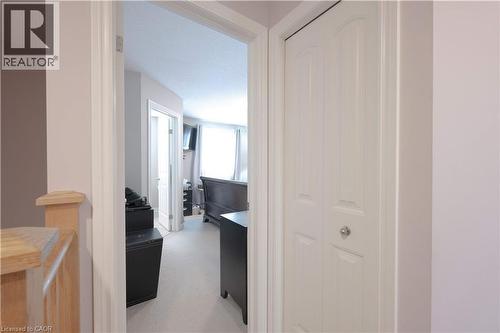 Hallway with light colored carpet - 535 Margaret Street Unit# 74, Cambridge, ON 
