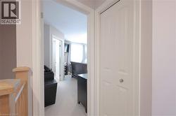 Hallway with light colored carpet - 