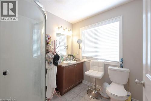 Bathroom with light tile patterned floors, vanity, and a shower stall - 535 Margaret Street Unit# 74, Cambridge, ON 