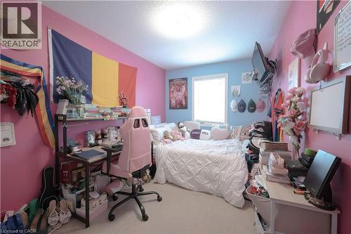 Carpeted bedroom featuring a textured ceiling - 535 Margaret Street Unit# 74, Cambridge, ON 