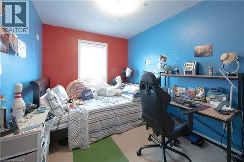 Bedroom featuring carpet and an office area - 535 Margaret Street Unit# 74, Cambridge, ON 