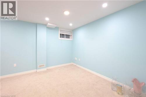 Carpeted empty room with baseboards and recessed lighting - 535 Margaret Street Unit# 74, Cambridge, ON 