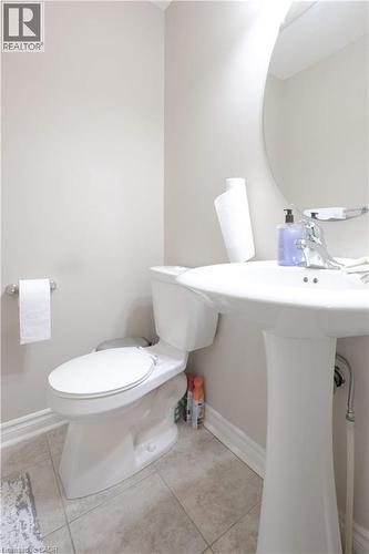 Half bath featuring light tile patterned flooring - 535 Margaret Street Unit# 74, Cambridge, ON 