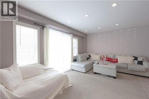 Living room with carpet and recessed lighting - 535 Margaret Street Unit# 74, Cambridge, ON 