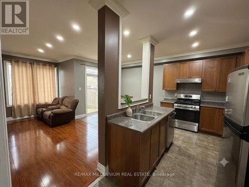 Upper - 33 Nomad Crescent, Brampton, ON - Indoor Photo Showing Kitchen With Double Sink