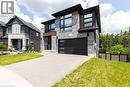 Contemporary exterior featuring stone veneer and dark siding accents - 71 Ian Ormston Drive, Waterloo, ON 