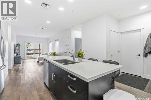 104 1010 Main Street, Saskatoon, SK - Indoor Photo Showing Kitchen With Double Sink