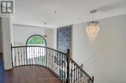 Second floor hallway open to below. - 