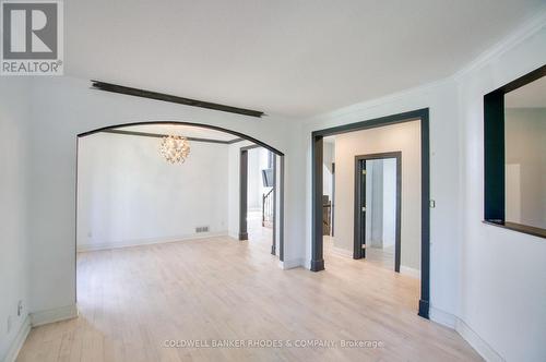 Living room looking into dining room. - 32 Catterick Crescent, Ottawa, ON 