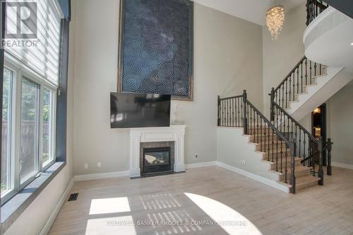 Family room is two stories and open to above. - 32 Catterick Crescent, Ottawa, ON 