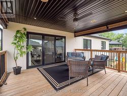 Covered back deck off the main floor living room - 
