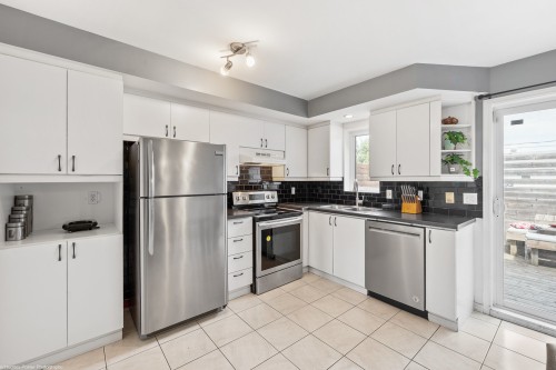 Kitchen - C-252 Boul. J.-A.-Paré, Repentigny (Le Gardeur), QC - Indoor Photo Showing Kitchen With Double Sink