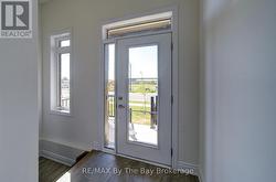 Front Entry Door & Step Down to Basement Door - 