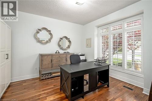 Bedroom at the front of the house with an adjacent full bath - 4285 Couples Crescent, Burlington, ON - Indoor Photo Showing Office