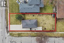 Aerial overview of property's location with property boundaries highlighted - 