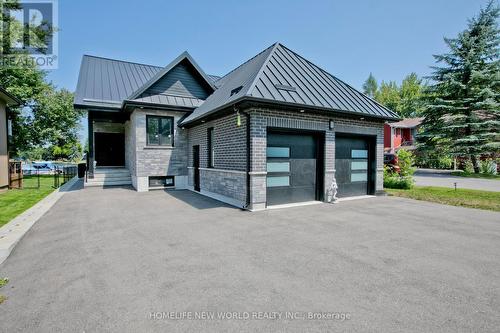62 Simcoe Road, Ramara, ON - Outdoor With Facade
