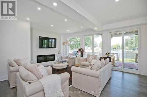 62 Simcoe Road, Ramara, ON - Indoor Photo Showing Living Room With Fireplace