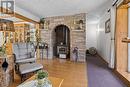 58 Blaffert, Wahnapitae, ON  - Indoor Photo Showing Living Room With Fireplace 