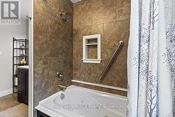Includes shower and jet-soaker tub. - 