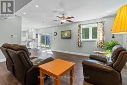 Living room or rec-room space with patio walkout - 