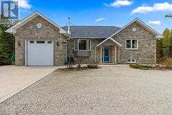 A raised bungalow with 2,399 sq ft on 2 levels. - 
