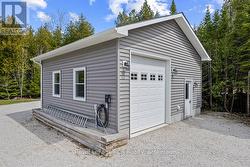 Oversized 24x24 heated garage with 10ft doors x2. - 