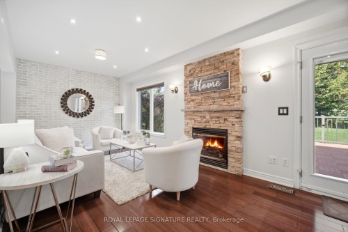 901 Knotty Pine Grove, Mississauga, ON - Indoor Photo Showing Living Room With Fireplace