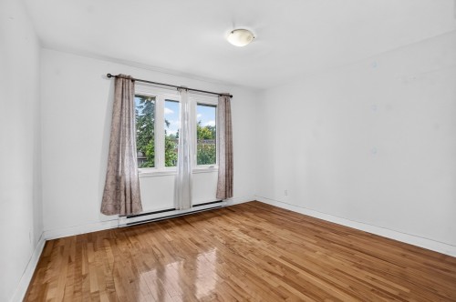 Chambre à coucher - 10377 Rue Prieur O., Montréal (Ahuntsic-Cartierville), QC - Indoor Photo Showing Other Room