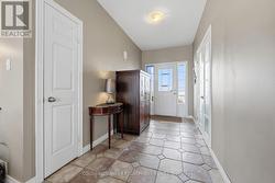 Foyer with garage entrance on left - 