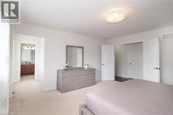 Plush carpeting and light-toned walls define this interior space - 