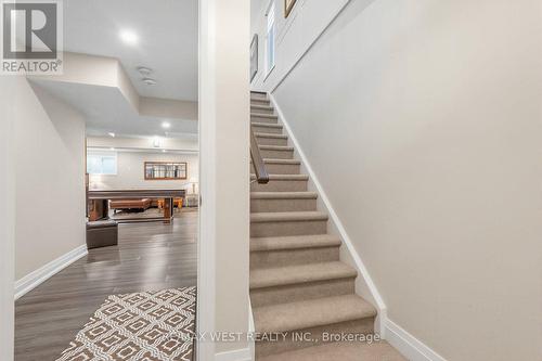 113 Dory Row - Stairs to Basement/Rec Room - 113 Dory Row, Blue Mountains, ON - Indoor Photo Showing Other Room