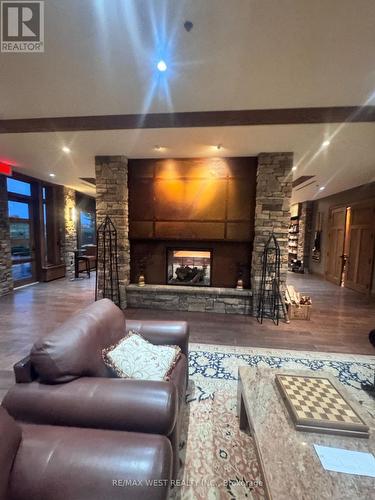 Lora Bay Rec Centre Lounge - 113 Dory Row, Blue Mountains, ON - Indoor With Fireplace