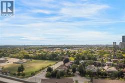 Expansive city and suburban landscape under a clear sky - 
