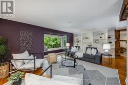 Living Room has Built-in Shelving - 