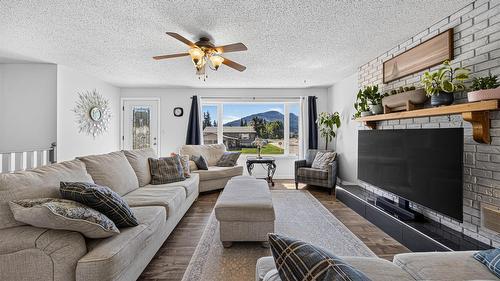 1386 Cypress Drive, Sparwood, BC - Indoor Photo Showing Living Room With Fireplace