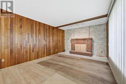 Sunken Family Room with a Woodburning Fireplace - 